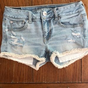 American Eagle Shortie Denim Shorts w/ PomPom Hem
